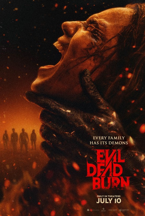 A terrified woman with a clawed hand gripping her face screams, surrounded by fiery sparks. Five shadowy figures stand in the background. Text: "Evil Dead Burn," "Every Family Has Its Demons," "Only in Theaters July 10."